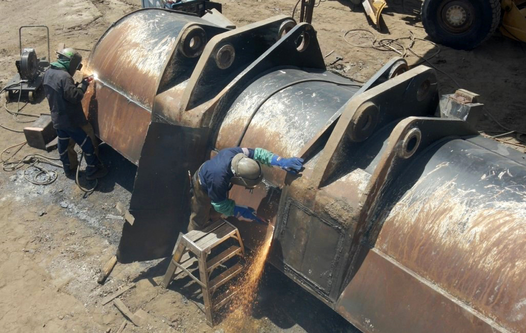Cutting Edge Supply's welding team begins restoration work on a LeTourneau Loader Bucket.